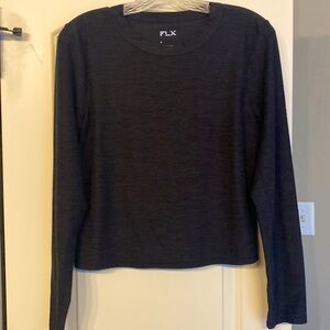 Long sleeve shirt.  Poly spandex. Heathered black. Flx brand